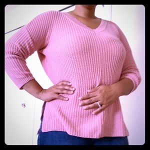 Pink, high-low sweater. Long 3/4 length sleeves.